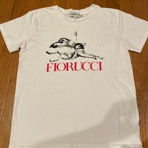 Women’s size small Forucci top. Excellent condition. Worn once